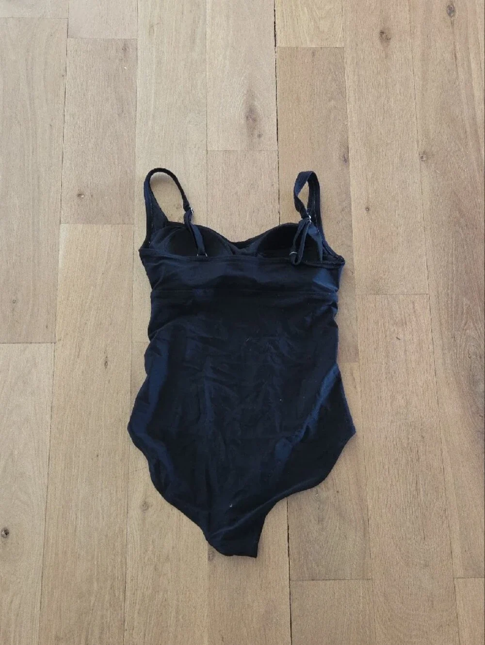 Sleek Black One-Piece Swimsuit with Supportive Cups